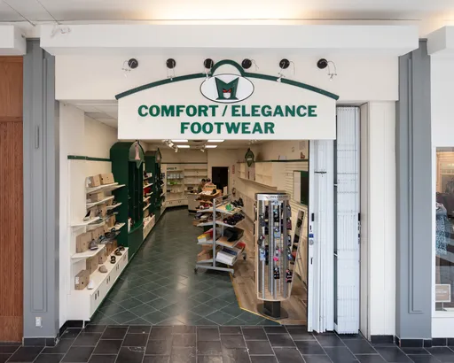 COMFORT/ELEGANCE FOOTWEAR logo